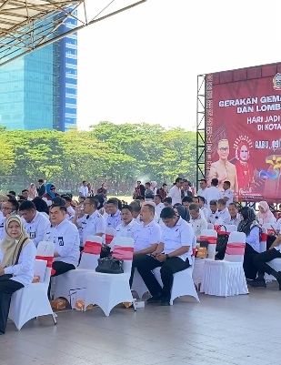 Kadis Perkim Makassar Hadiri Acara Gerakan Makan Telur dalam Rangka HUT Sulsel ke-355